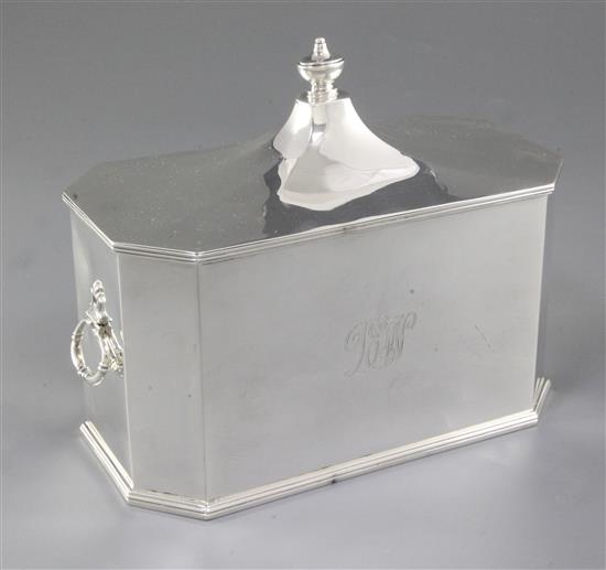 A George V silver two handled octagonal tea caddy, by Richard Comyns, length 202mm, weight 27.1oz/845grms.
